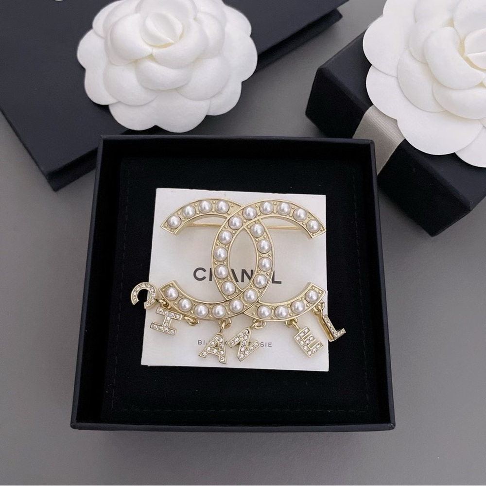 CHANEL Gold and Pearl Logo Brooch